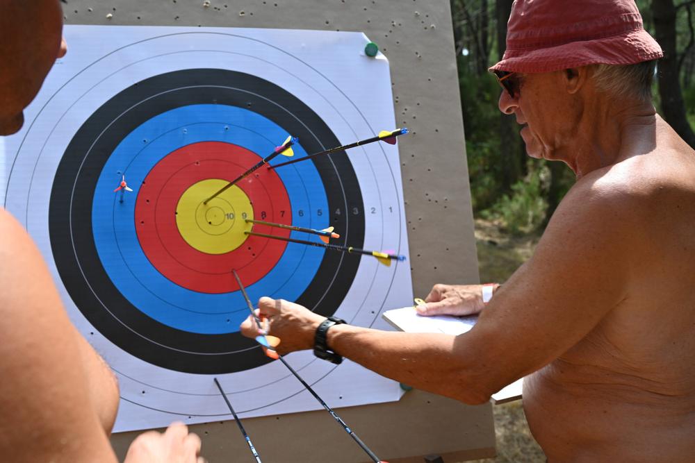 Archers competing at the national naturist archery contest at CHM Montalivet.