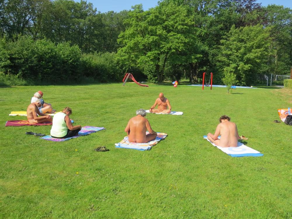 Outdoor group yoga session at Domaine de la Gagère.